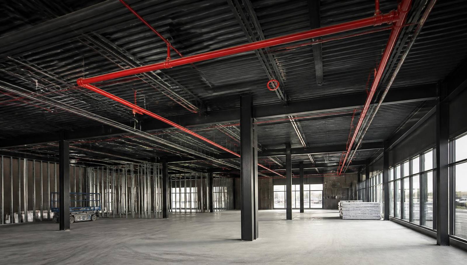 Commercial fire sprinkler piping installed in a steel-framed building